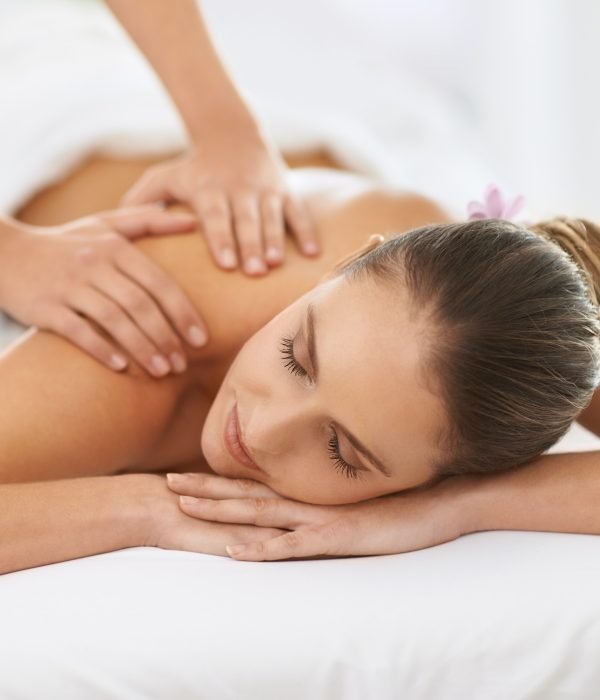 relaxed-by-magical-hands-cropped-shot-of-a-gorgeous-young-woman-enjoying-a-massage-.jpg